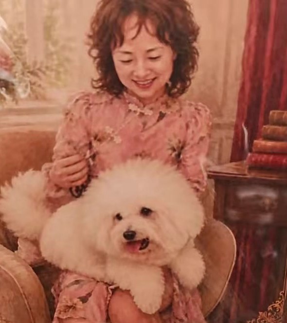 Portrait of a woman and her dog, revealed inside a wooden keepsake box